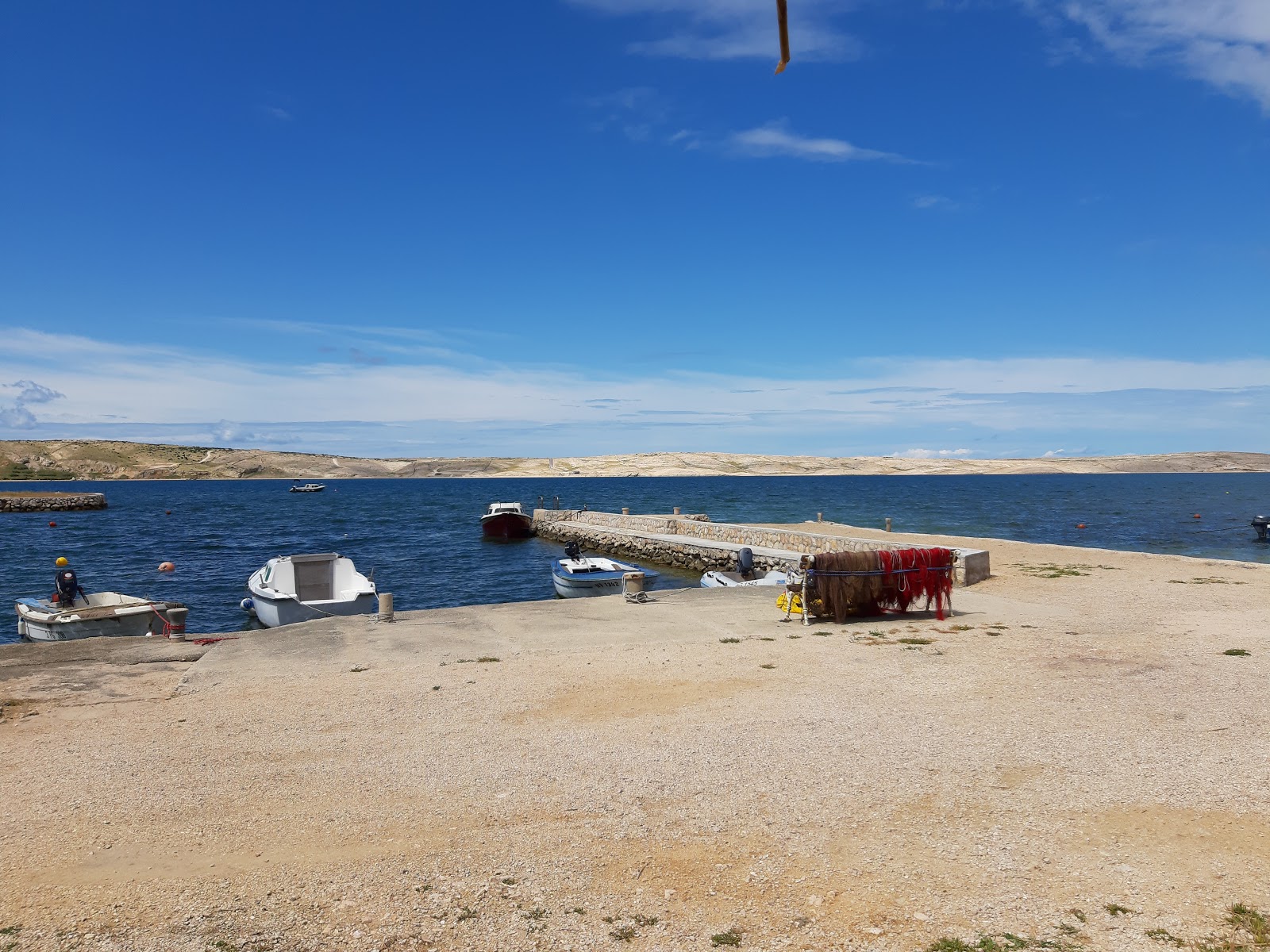 Foto van Kustici beach met kleine multi -bays