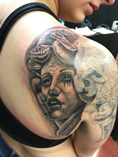 Explore tattoo ideas for writers, creative tattoo ideas in Lemoyne, available at Ego Ink Tattoo & Body Piercing Shop