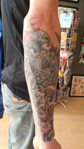Explore lion tattoo ideas, creative tattoo ideas in Covington, available at Illuminaut Tattoo