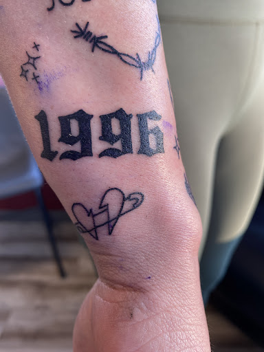 Explore above knee tattoo ideas, creative tattoo ideas in Great Falls, available at Touch of Ink Tattoos