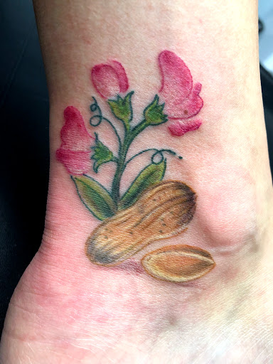 Explore women half sleeve tattoo ideas, creative tattoo ideas in Greenfield, available at Tattoos In Time Studio