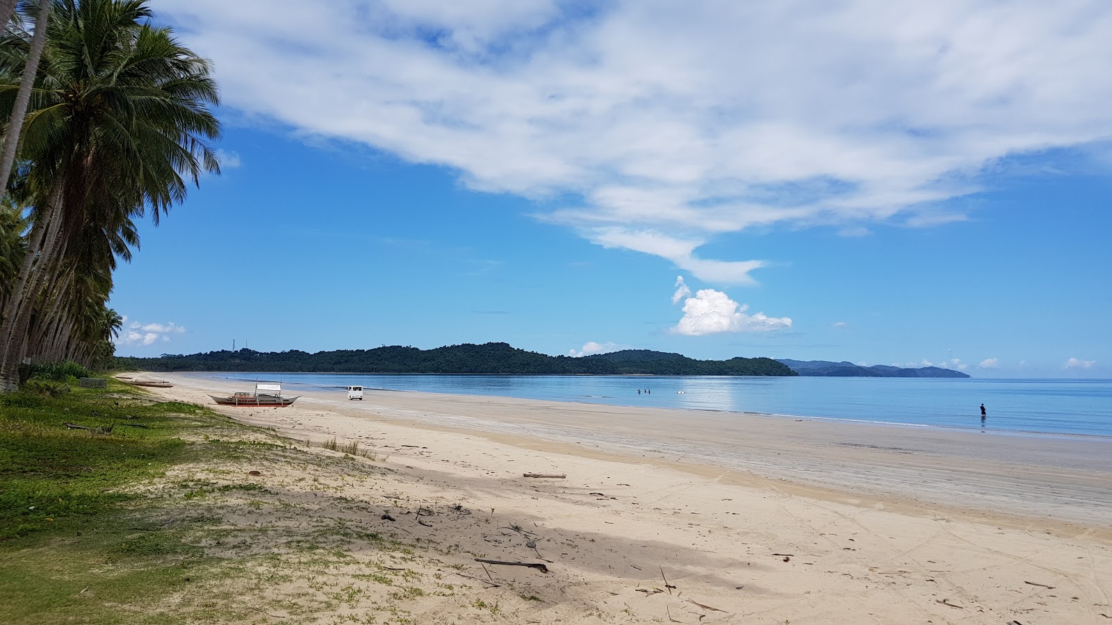 Foto von Pinagmangalokan Beach mit heller feiner sand Oberfläche