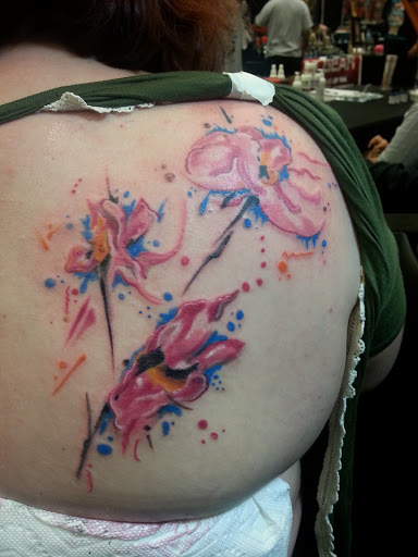 Explore quarter sleeve tattoo ideas for women, creative tattoo ideas in Spencer, available at Ink Envy Tattoo And Body Piercing