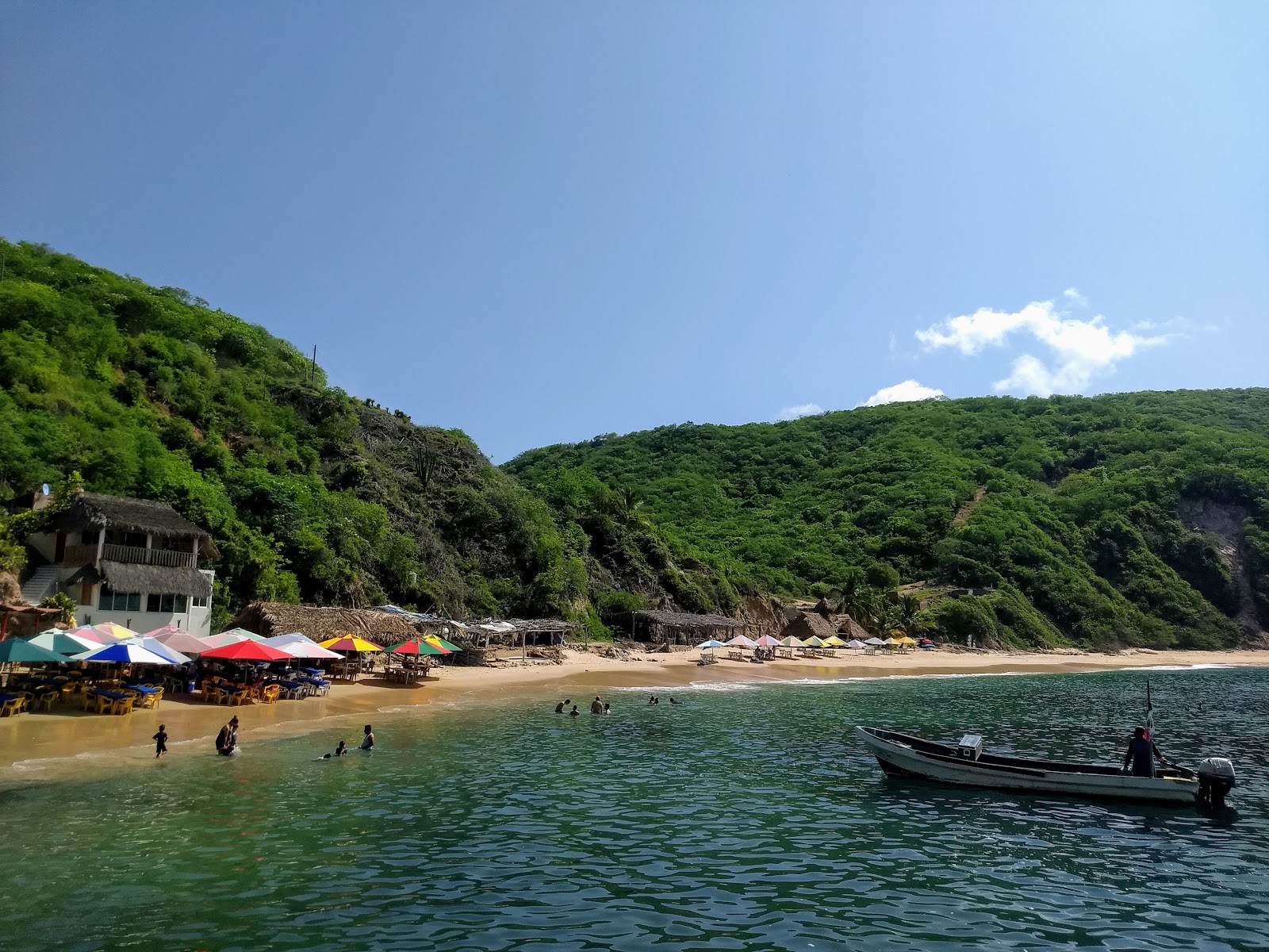 Foto af Tehuamixtle beach med lys sand overflade