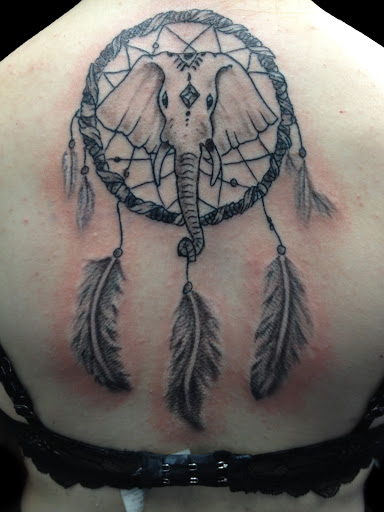 Explore dark tattoo ideas for men, creative tattoo ideas in Dunn, available at Yankee Tattoo and Piercing