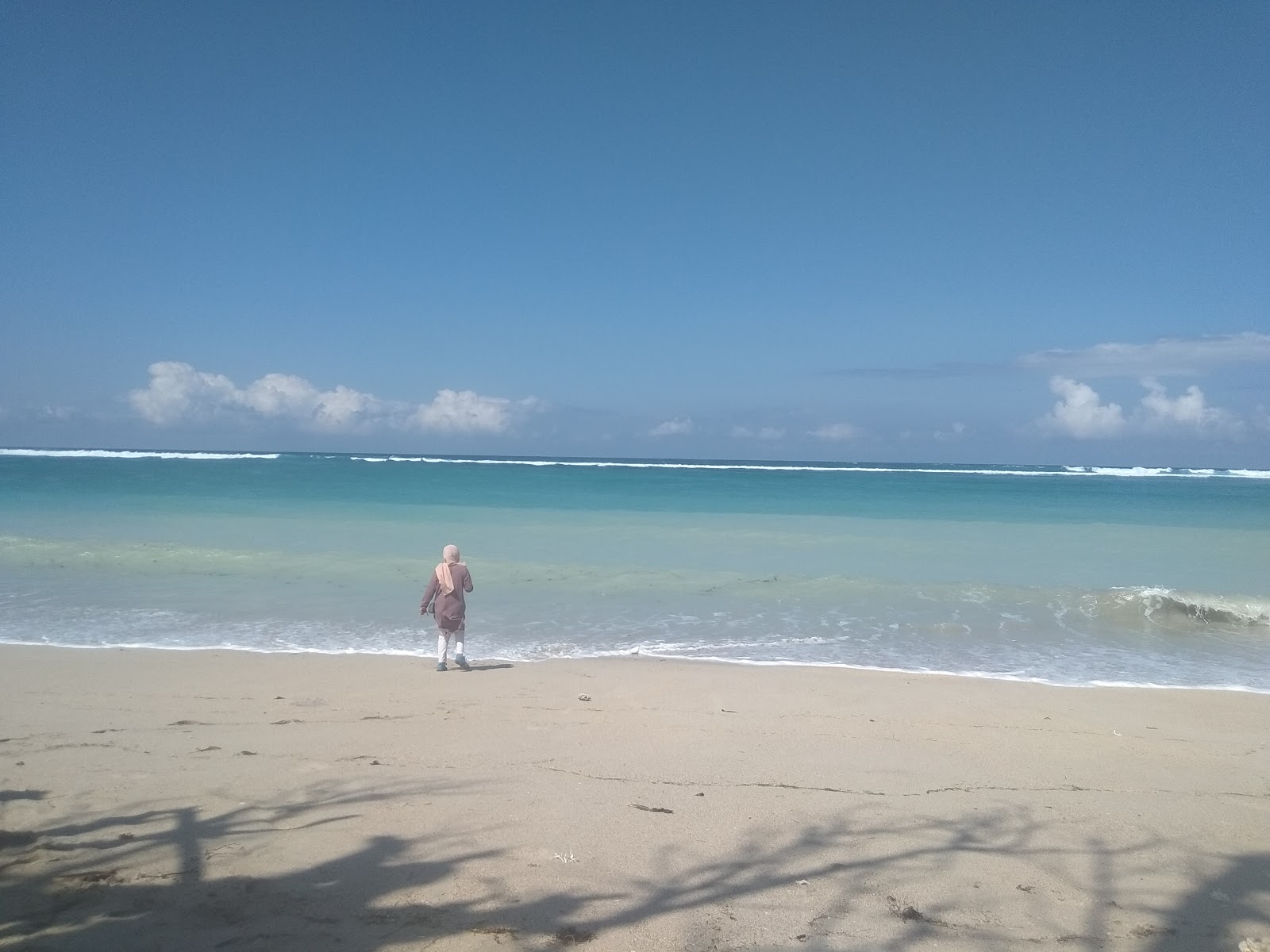 Foto de Torok Beach e o assentamento