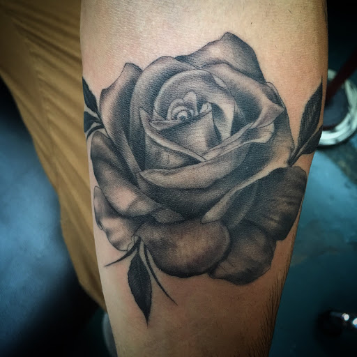 Explore big brother tattoo ideas, creative tattoo ideas in Glenwood Springs, available at Spyder Rose Tattoo