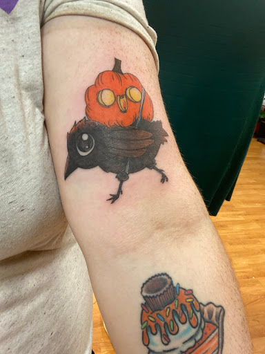 Explore traditional knee tattoo ideas, creative tattoo ideas in Madison, available at Golden Phoenix Tattoo Co.