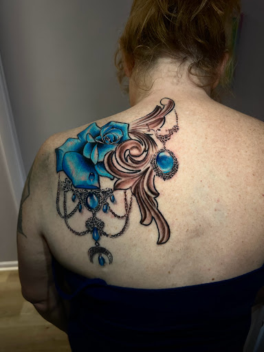 Explore men's back tattoos ideas, creative tattoo ideas in Fond Du Lac, available at Underground Ink