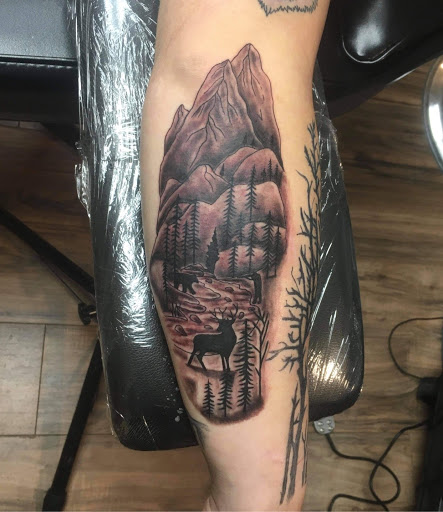 Explore tattoo ideas for photographers, creative tattoo ideas in Hudson Falls, available at ALTERED ADDICTION TATTOOS
