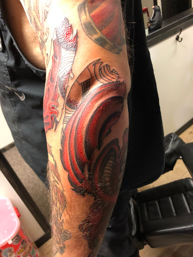 Find animal neck tattoo ideas for your next unique tattoo in Jefferson at Slammin Ink Tattoo