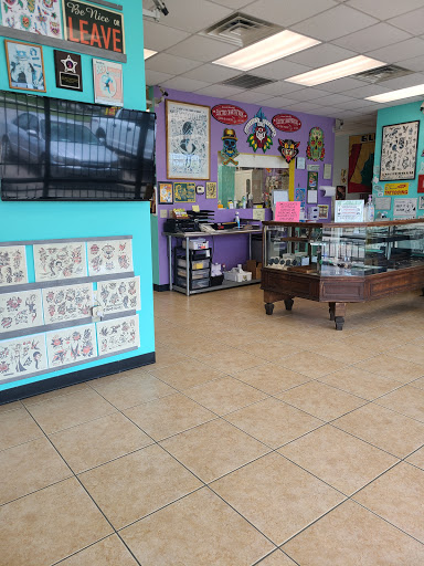 Explore lotus flower tattoo ideas, creative tattoo ideas in Houston, available at The Electric Chair Tattoo & Piercing