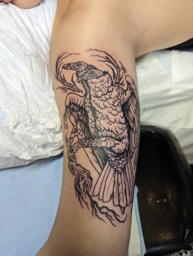 Explore tattoo ideas for black men, creative tattoo ideas in Oakland, available at Old Crow Tattoo and Art Gallery