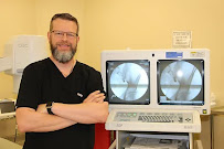 Dr. Carlos J. Giron, MD - Photo 2 - Car repair in Macon, GA, Macon