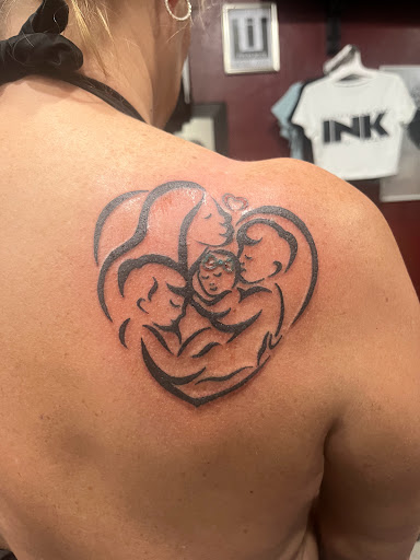 Explore black flower tattoo ideas, creative tattoo ideas in Cape Coral, available at UNRIVALED INK