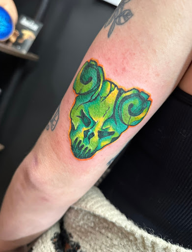 Explore love is pain tattoo ideas, creative tattoo ideas in Plattsmouth, available at Stabbed Ink