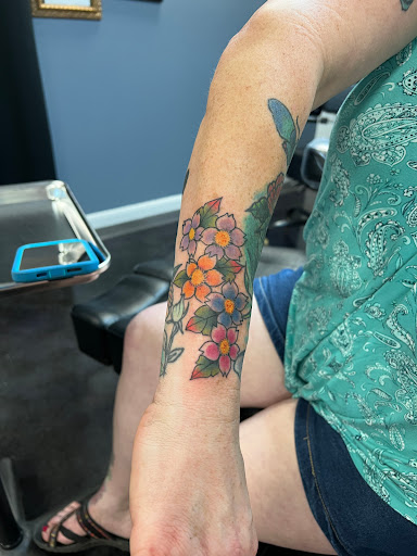 Explore mother father tattoo ideas, creative tattoo ideas in Ocala, available at City On The Hill Tattoo