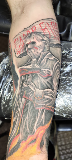 Explore tattoo ideas chest and arm, creative tattoo ideas in Angola, available at Hoodlum Ink