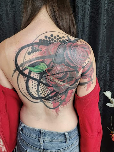 Explore cat tattoo ideas for guys, creative tattoo ideas in Mebane, available at The Cardinal Skin Art & Gallery