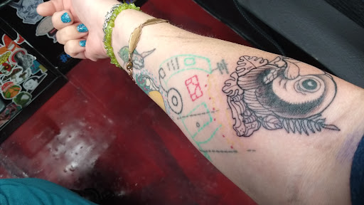 Explore blue line tattoo ideas, creative tattoo ideas in Fort Worth, available at Wild Rooster Tattoo & Piercing