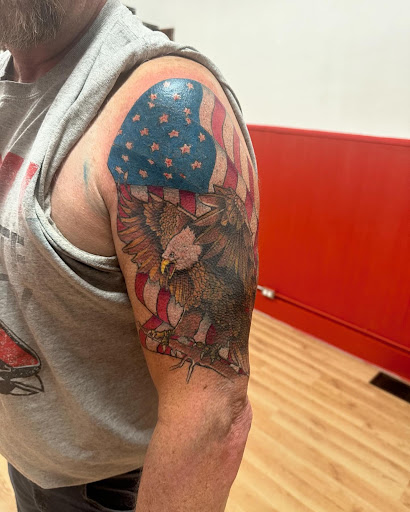 Explore upper back tattoo ideas for guys, creative tattoo ideas in Hartford City, available at Journey North Tattoo Company