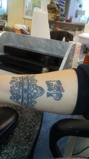 Explore male family tattoo ideas, creative tattoo ideas in Buffalo, available at Removery Tattoo Removal & Fading