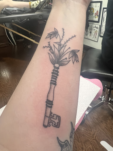 Explore roman numerals tattoo ideas, creative tattoo ideas in Buffalo, available at True Gloom Tattoo Studio