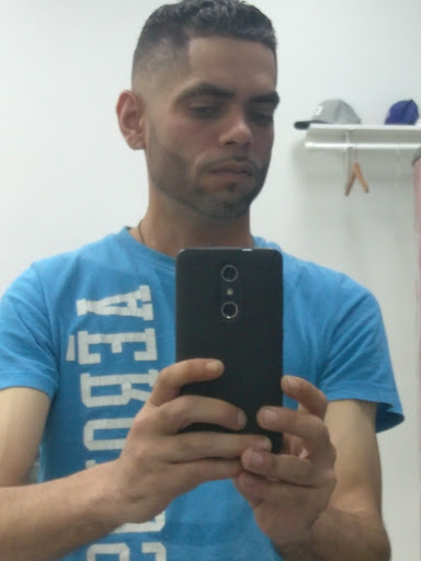 Barber Shop «Amigo Barber Shop», reviews and photos, 23 S Main St C, Freeport, NY 11520, USA