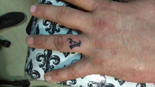 Explore wolf tattoo ideas for guys, creative tattoo ideas in Bowling Green, available at Taboo Tattoos and Piercings