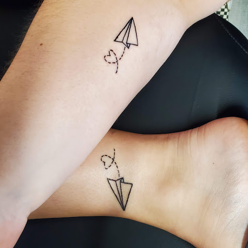 Explore tricep tattoo ideas for guys, creative tattoo ideas in Brandenburg, available at Envious Ink Studio