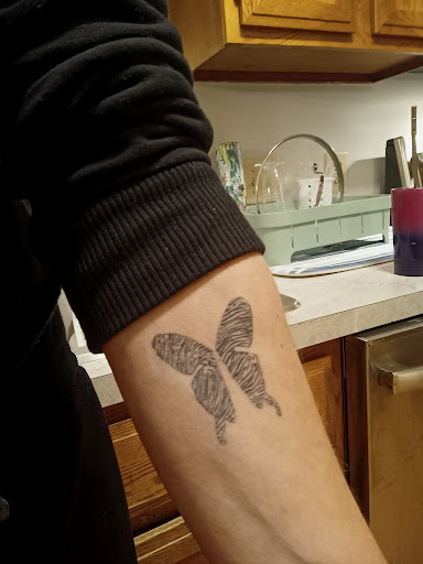 Explore jersey tattoo ideas, creative tattoo ideas in Saint Paul Park, available at Lady Liberty Tattoo