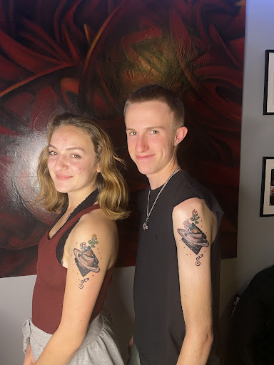 Explore breast cancer ribbon tattoo ideas, creative tattoo ideas in Prescott, available at Bold as Love Tattoo and Piercing Studio