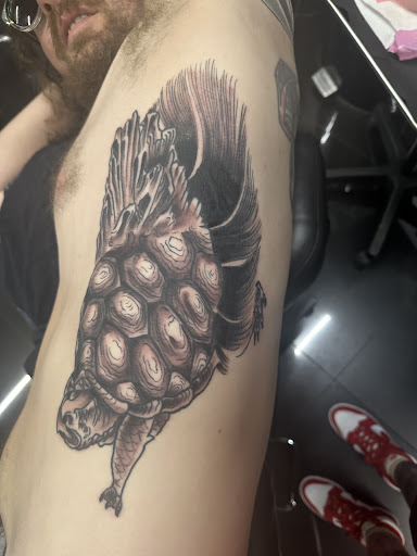 Explore small tattoo ideas for men arm, creative tattoo ideas in Bryant, available at Goon Tattoo