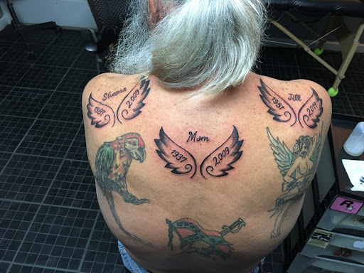 Explore tattoo ideas back of neck, creative tattoo ideas in Centre, available at Ink You Tattoos