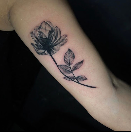 Explore floral arm sleeve tattoo ideas, creative tattoo ideas in Odessa, available at Black Cat Tattoo Company