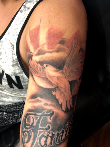 Explore christian tattoos ideas, creative tattoo ideas in Rapid City, available at Rushmore Tattoo Company LLC