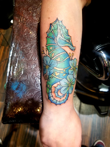 Explore hiking tattoo ideas, creative tattoo ideas in Torrington, available at Superior Lines Tattoo