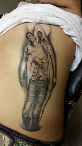 Explore men's inner bicep tattoo ideas, creative tattoo ideas in Fargo, available at Golden Dragon Tattoo