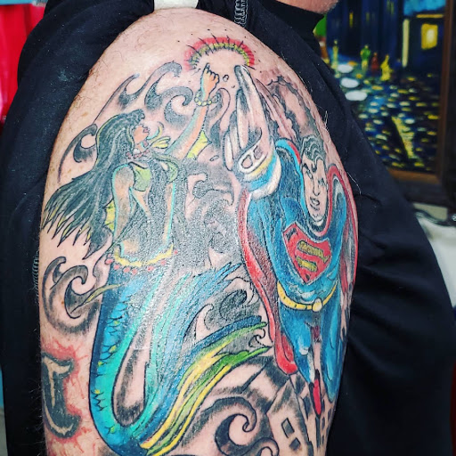 Explore lower leg tattoo ideas male, creative tattoo ideas in Englewood, available at The Original Big Daddy Tattoo & Body Piercing est.1997 est.1997