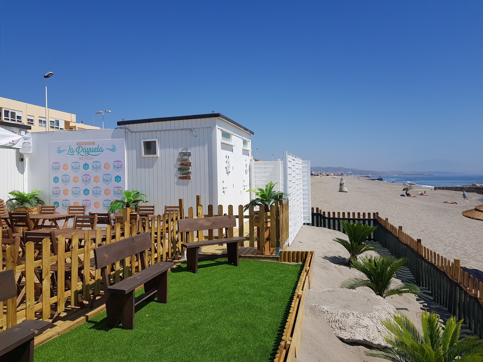 Foto av Playa de Levante med lång rak strand