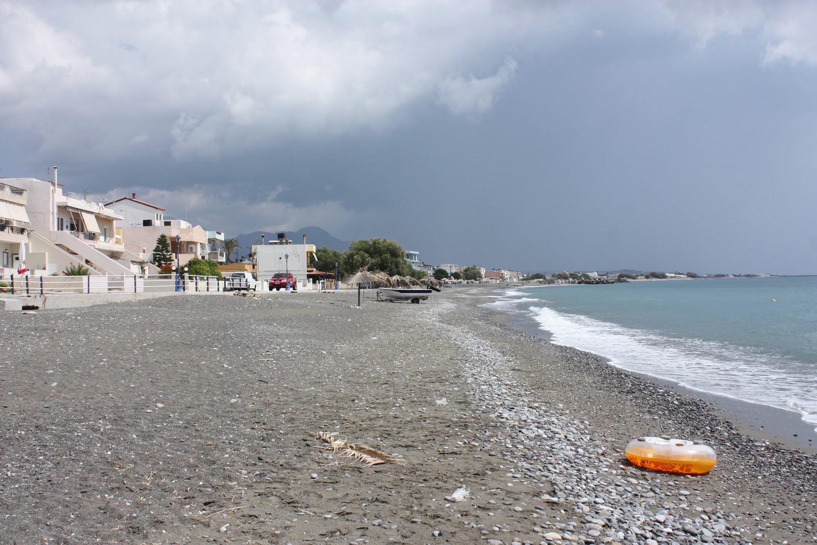 Foto von Gra Ligia beach mit beiger sand & kies Oberfläche