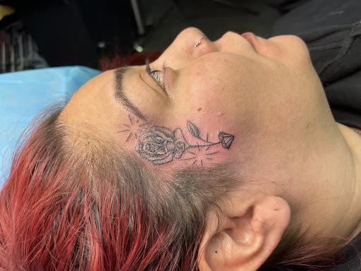 Find crown tattoo ideas for females for your next unique tattoo in Chicago at Keepsakes Tattoo Studio LLC