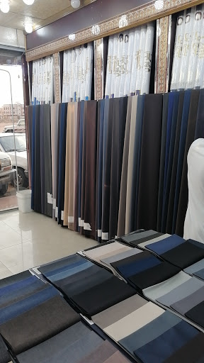 خياط البرنس للخياطةالرجالية 