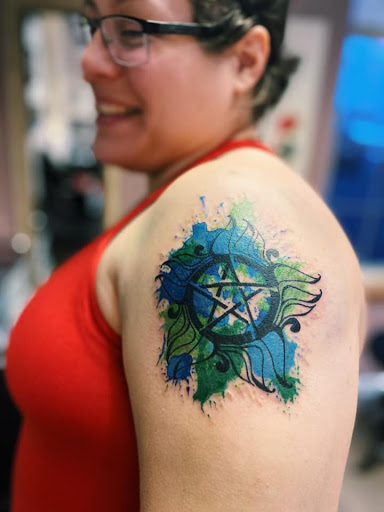 Explore dog paw tattoos ideas, creative tattoo ideas in Kenosha, available at Kenosha Tattoo Company