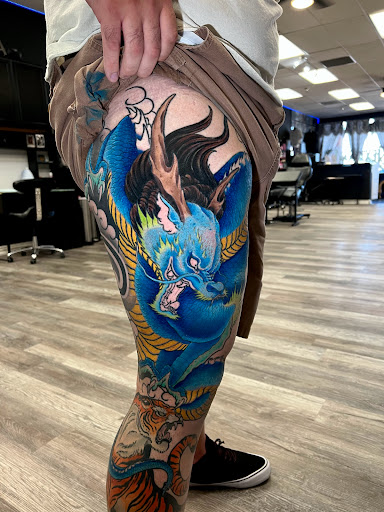 Explore palm tree tattoo ideas, creative tattoo ideas in Mesa, available at Next Wave Tattoos and Piercings 2