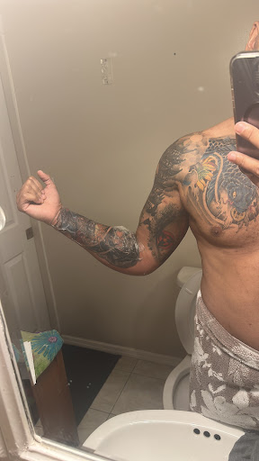 Explore banner tattoo ideas, creative tattoo ideas in Pompano Beach, available at Ink Castle Tattoo Studio