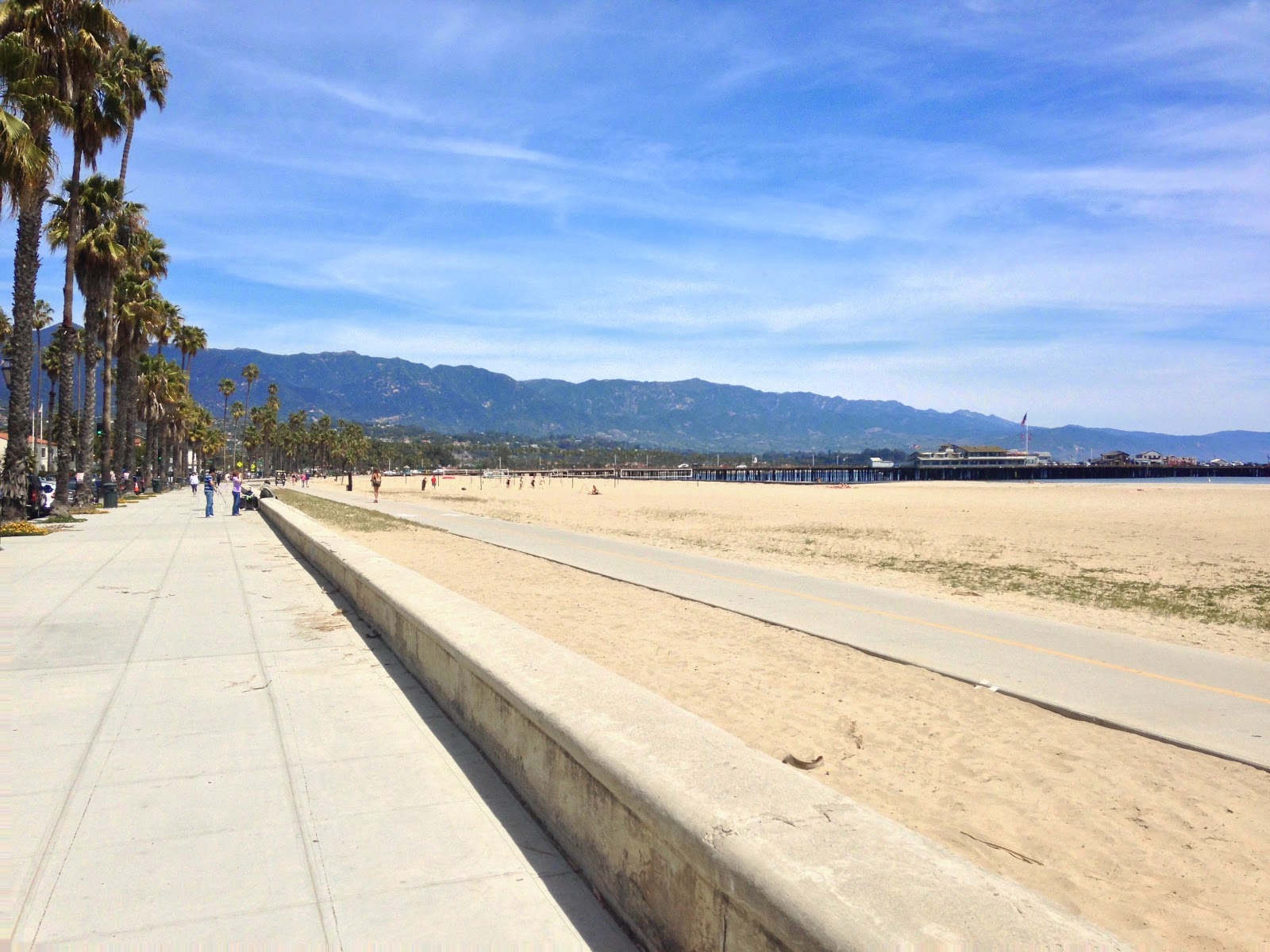 Foto av West Beach med lång rak strand