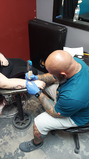 Tattoo Shop «Workhorse Tattoo Collective», reviews and photos, 16741 E Iliff Ave, Aurora, CO 80013, USA