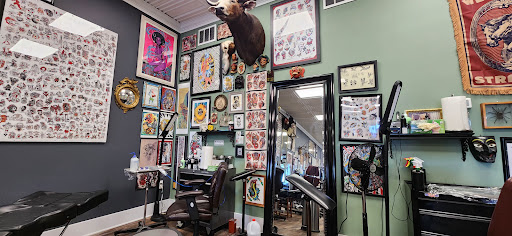 Find tattoo ideas for the back for your next unique tattoo in Medina at Scapegoat Tattoos