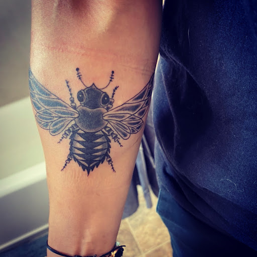 Explore coca cola tattoo ideas, creative tattoo ideas in Salt Lake City, available at Ingenuity Ink